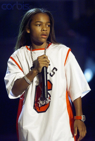 Original caption: Rapper Lil' Bow Wow performs during the first annual Black Entertainment Television awards show at the Paris Las Vegas hotel-casino in Las Vegas June 19, 2001. The performer won the Viewer's Choice Award for his song "What's My Name." REUTERS/Ethan Miller --- Image by © Reuters/CORBIS