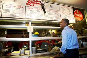 In this July 29, 2014 file photo, President Barack Obama orders barbecue at Arthur Bryants  (AP Photo/Jacquelyn Martin, File)