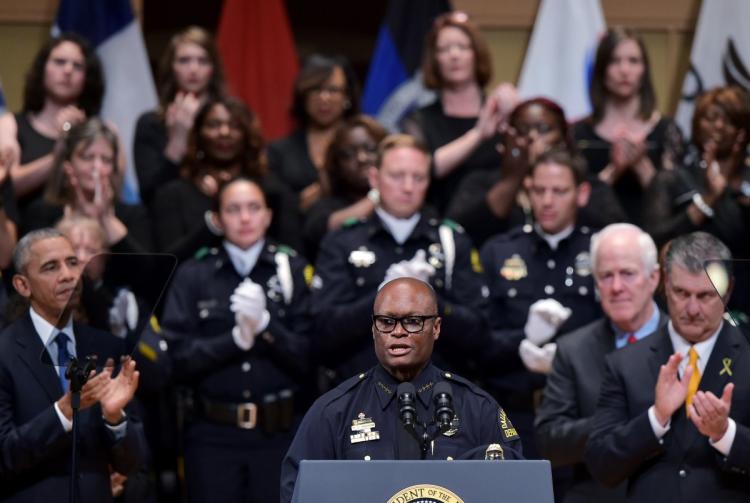 Dallas Police Chief David Brown addresses the audience at the interfaith ceremony.